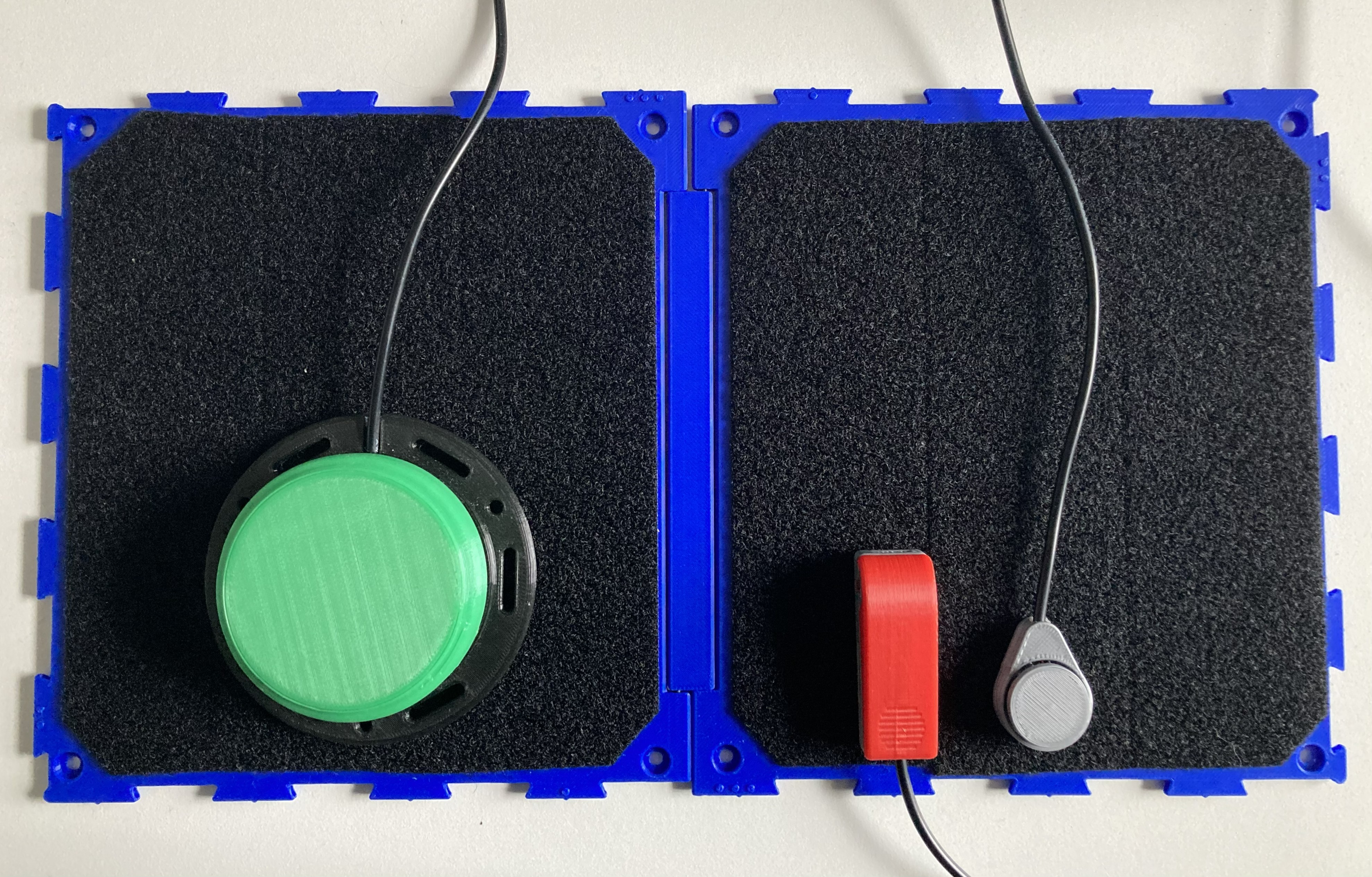 Connect Board holding three assistive switches in place